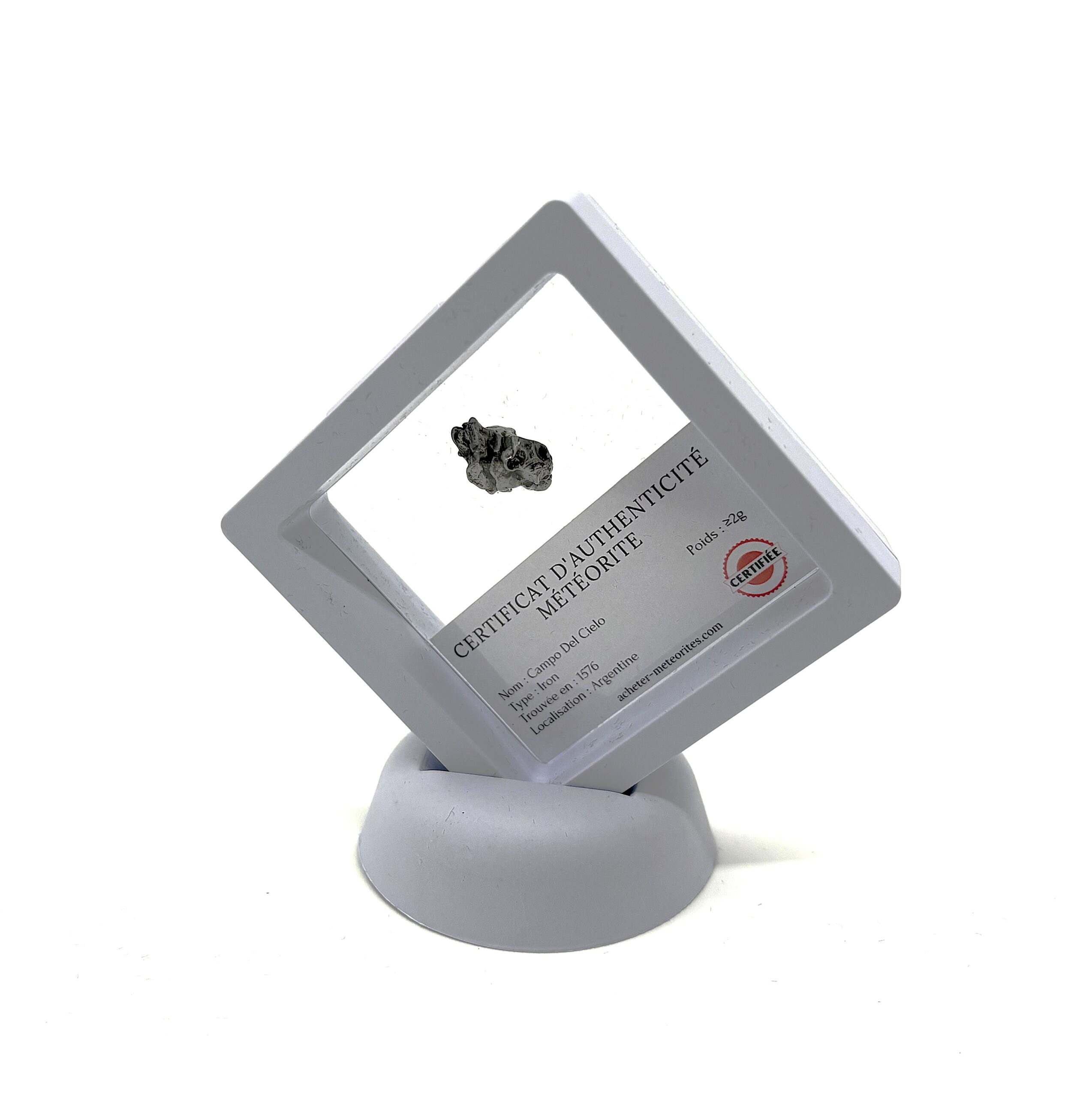 Campo del Cielo meteorite gift in white transparent plastic frame - minimum 1 g