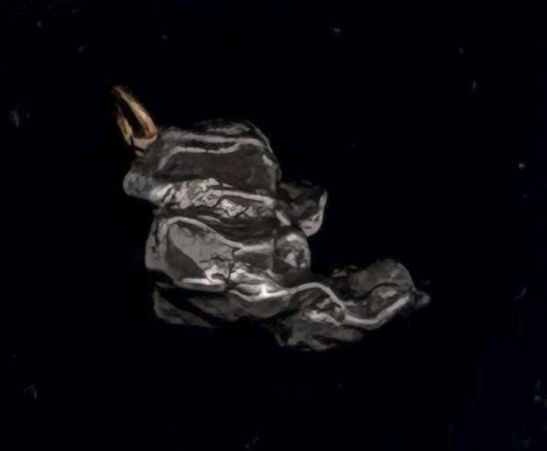campo del cielo gold pendant