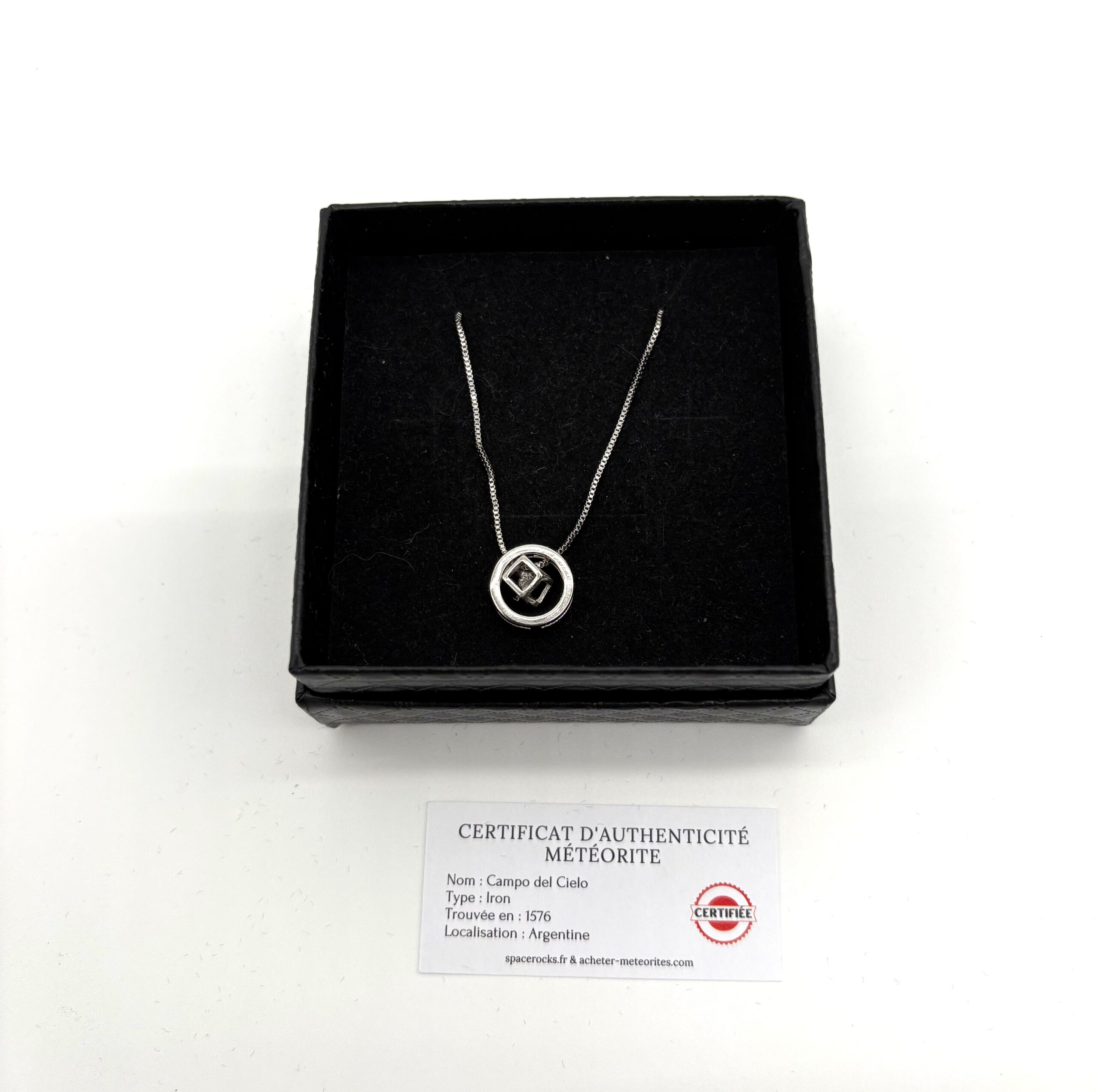 Modern silver necklace - round pendant with cubic cage and Campo del Cielo